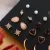 BOHO FLOWER & PEARL EARRING SET – 2026 WOMEN’S CRYSTAL STUDS & GEOMETRIC TASSEL EARRINGS